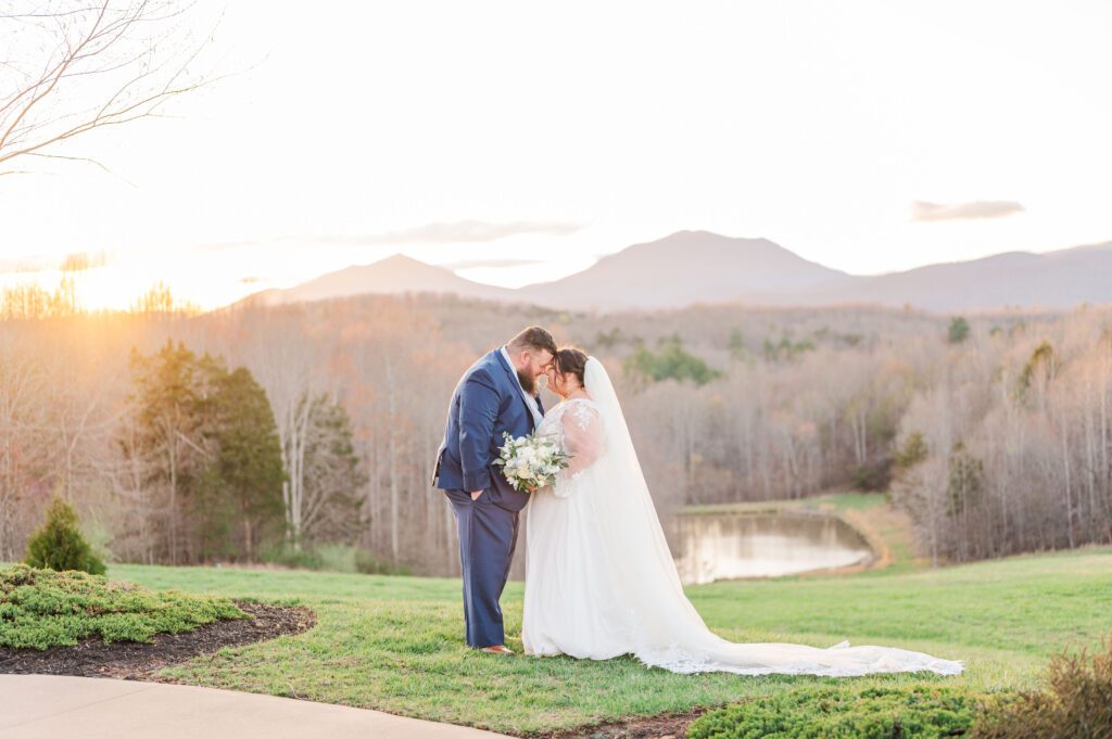 wedding couple touching foreheads at spring Virginia venue