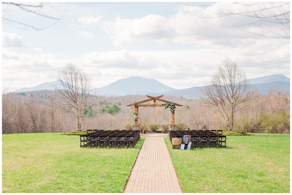 outdoor ceremony site with the mountain background at the Glass Hill Venue