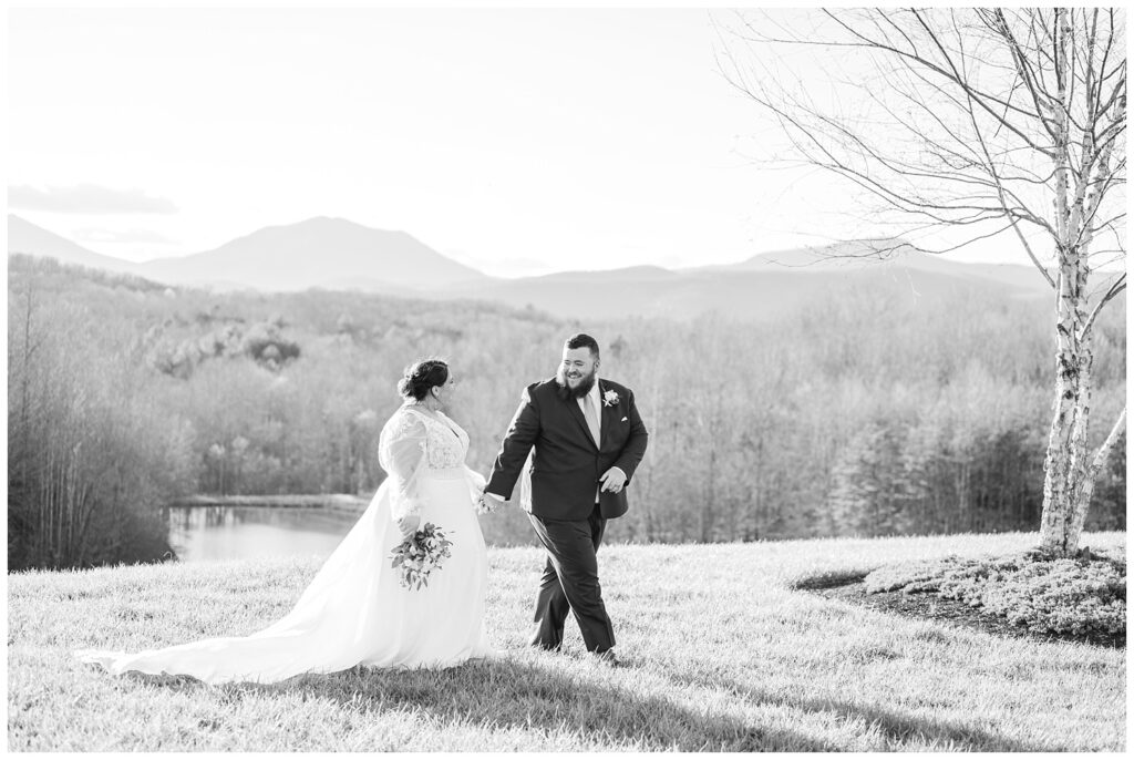 bride and groom walking along together at the Glass Hill Venue