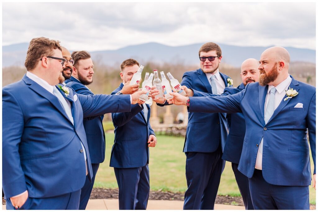 groomsmen toasting with Smirnoff Ice at Virginia wedding venue