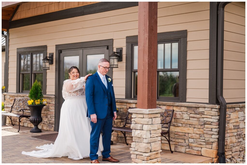 bride having a first look with her dad at Virginia wedding venue