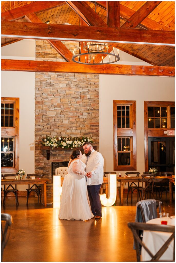 bride and groom having last private dance at the end of the reception