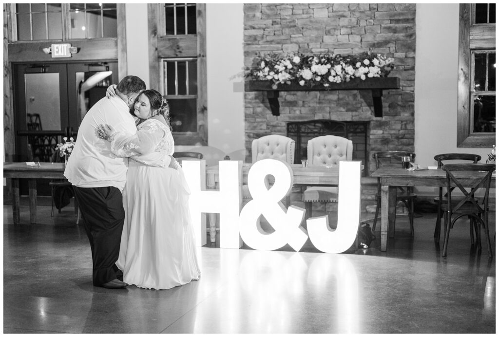 bride and groom having last private dance at the end of the reception