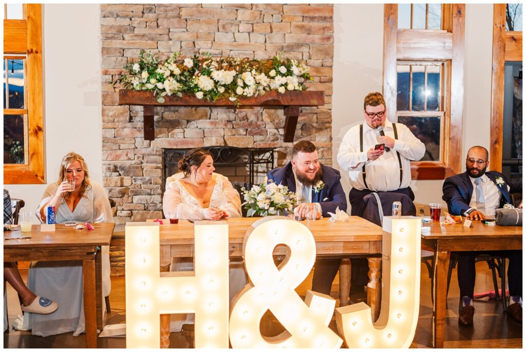 best man giving wedding toast at spring reception at the Glass Hill Venue