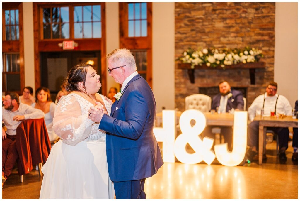 bride having first dance with her dad at Glass Hill Venue wedding reception