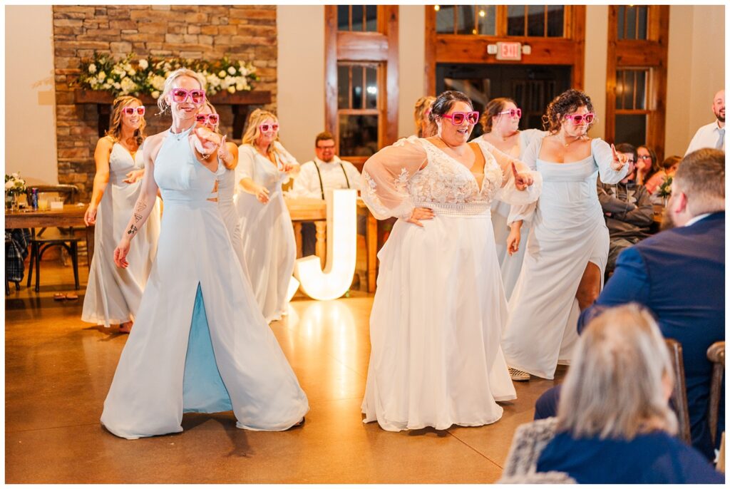 bridal party doing a dance for the groom at the wedding reception in Virginia 