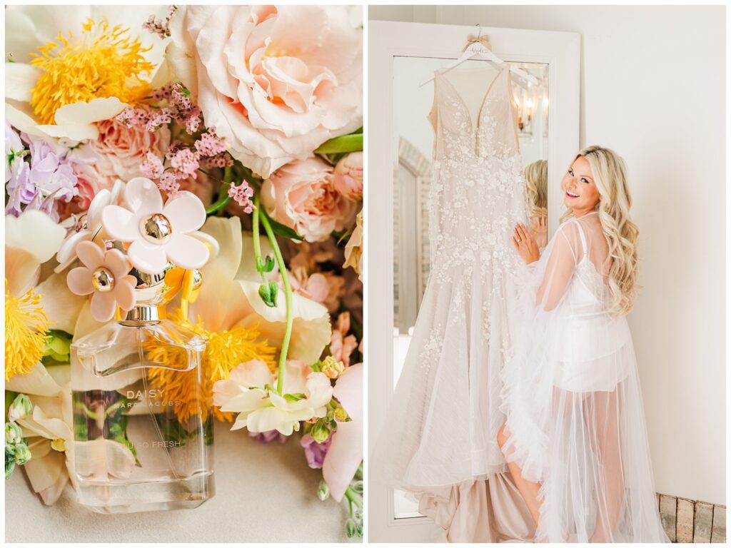 bride standing in front of her hanging wedding dress and smiling