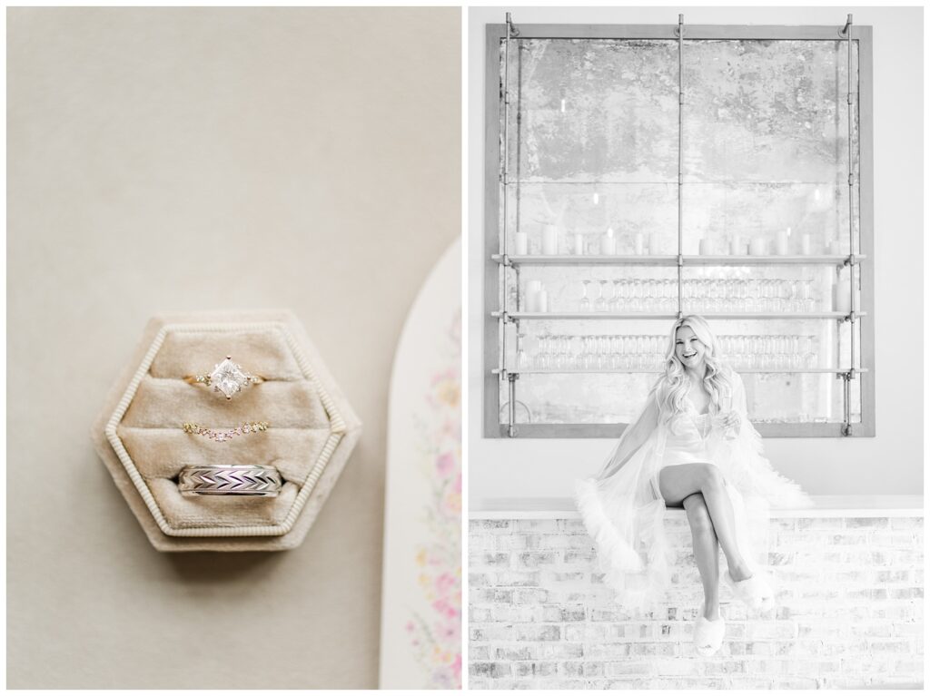 wedding rings sitting in an ivory ring box next to a pink invitation 