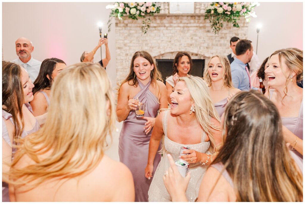 bride dancing with her friends at spring wedding reception in Wilmington