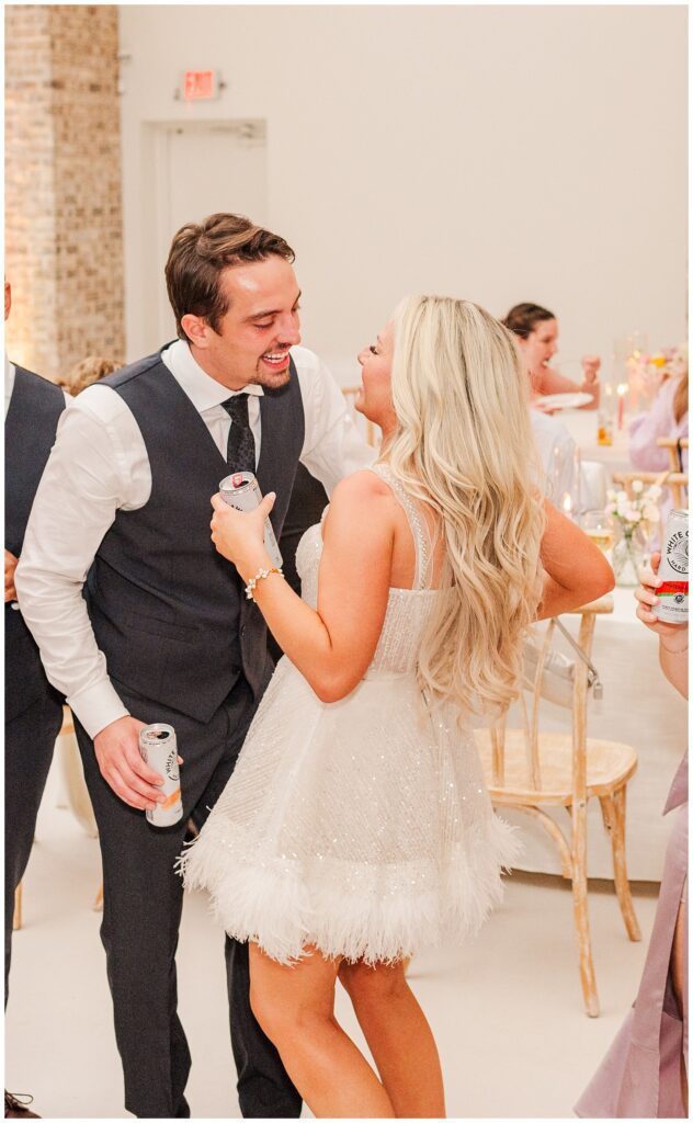 bride and groom dancing together during reception 