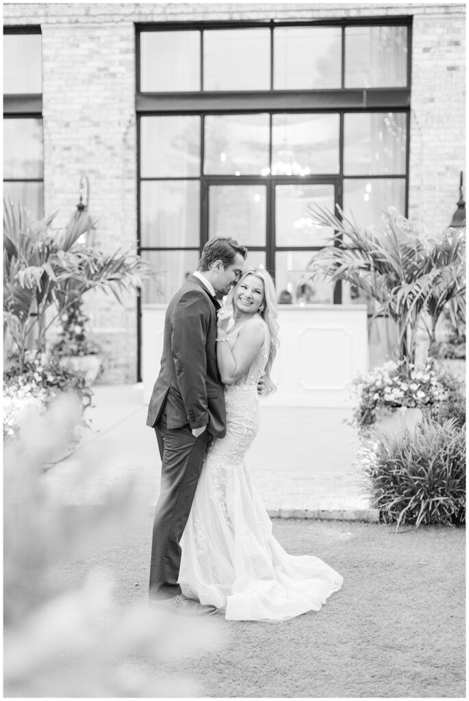 wedding couple taking golden hour portraits with Wilmington photographer