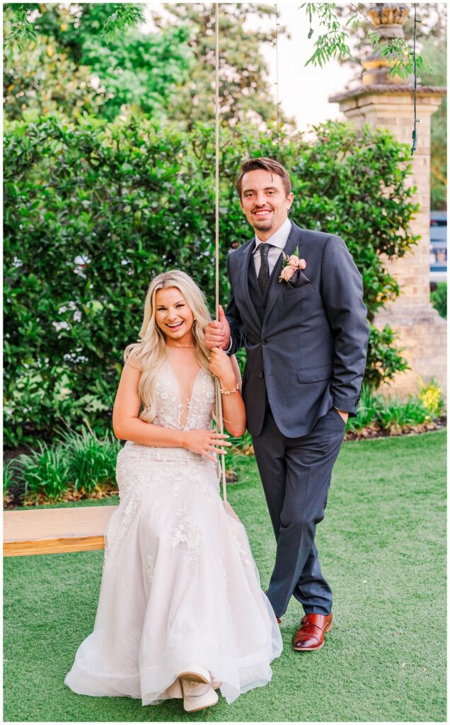 bride and groom at the outdoor swing during golden hour at Wilmington wedding venue