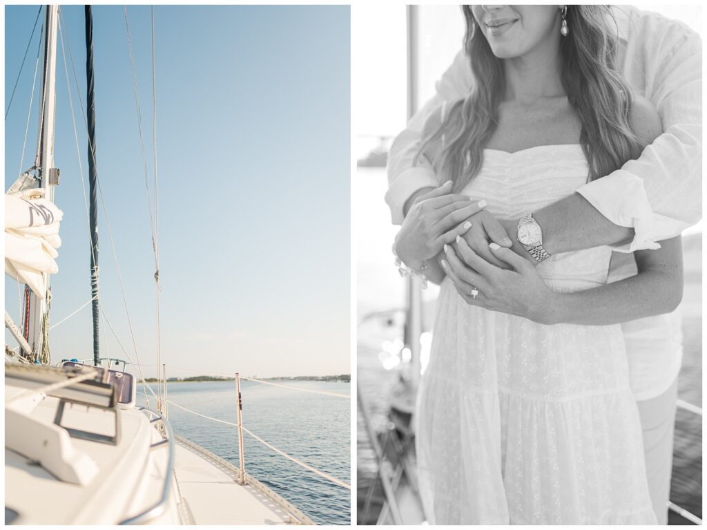 man wrapping his arms around his fiancee while standing on a sailboat