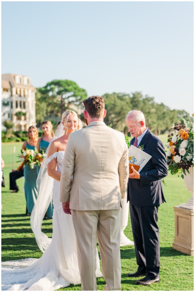 bride and groom facing each other at outdoor ceremony in Hilton Head