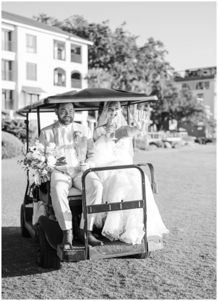 bride and groom get a ride on the golf cart back to the resort for cocktail hour