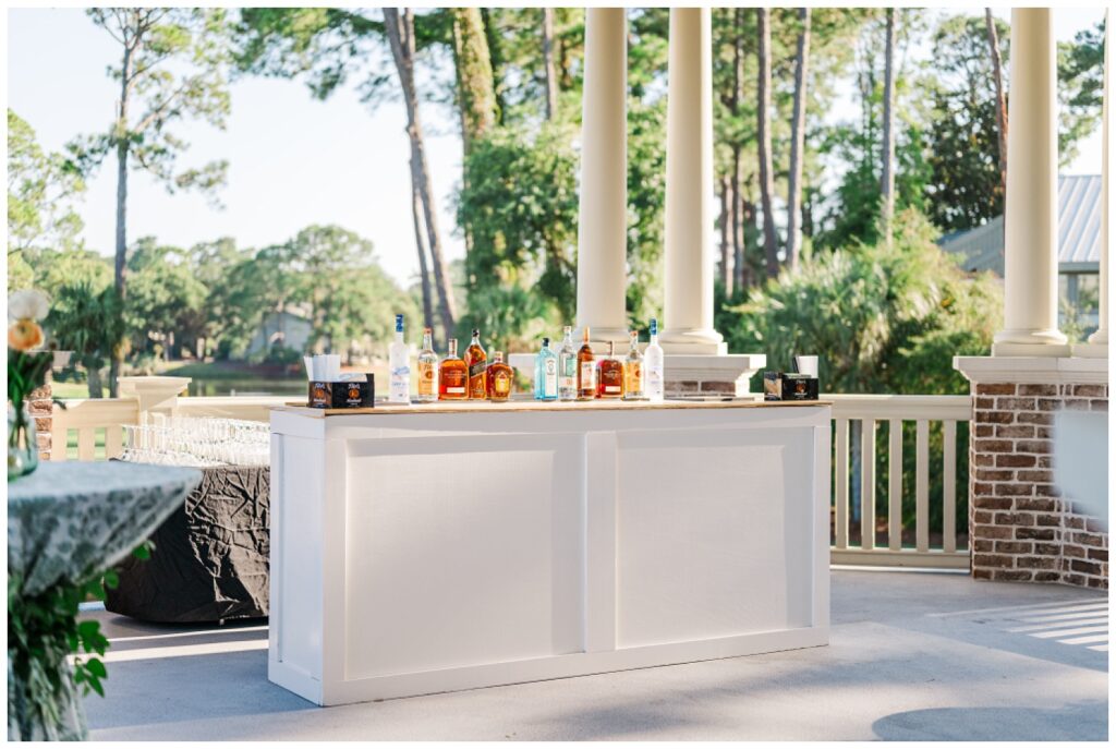 outdoor bar at cocktail hour on the patio at Sea Pines Resort