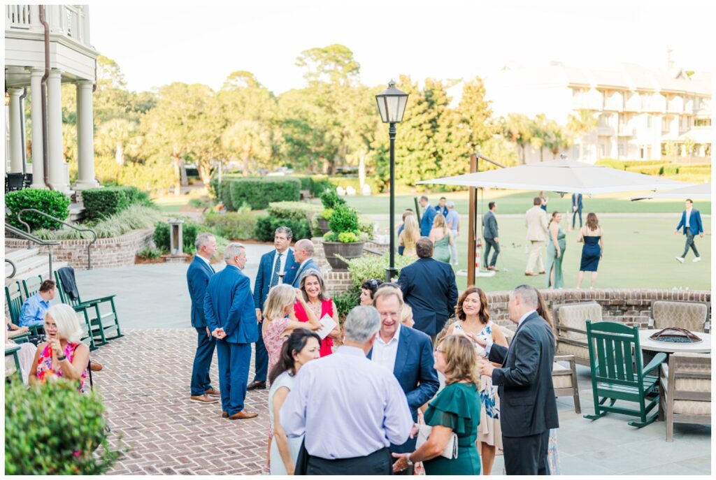 wedding guests mingling around during cocktail hour at Hilton Head resort 