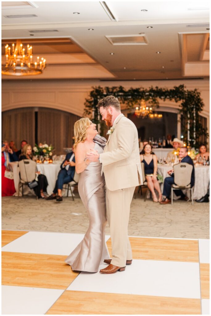 groom dancing with his mom during wedding reception at Sea Pines Resort