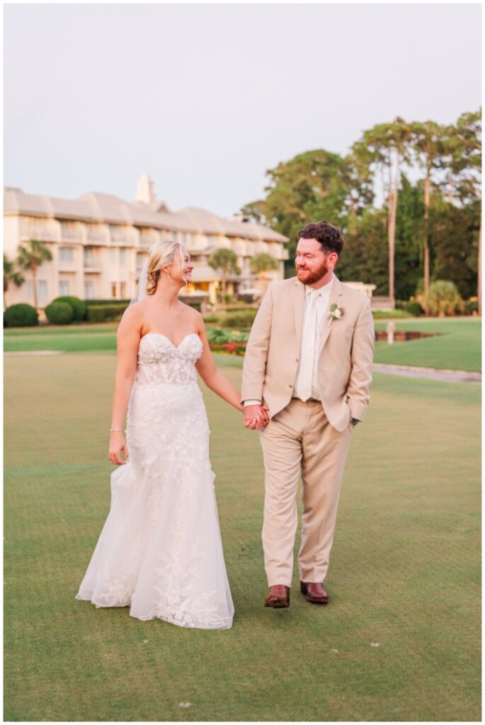 sunset portraits of the bride and groom on the golf course in Hilton Head