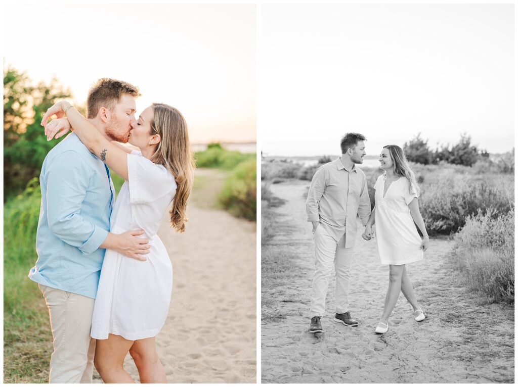 couple holding hands and walking along a beach path smiling