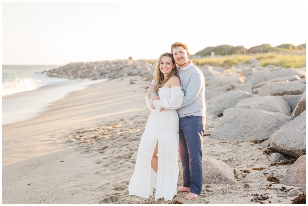 Fort Fisher engagement photographer posing a couple at Kure Beach