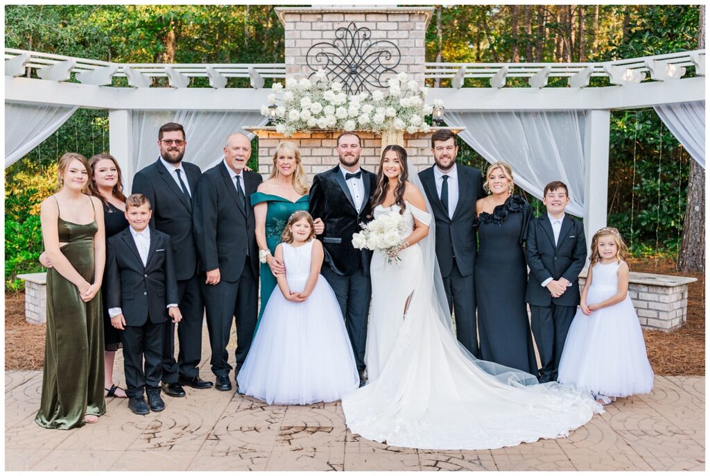 family portraits at outdoor ceremony site at Malachi Meadows 