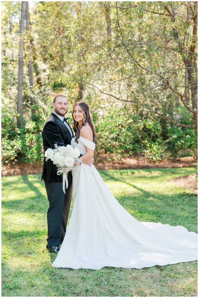 bride and groom portraits before the ceremony outside at Malachi Meadows