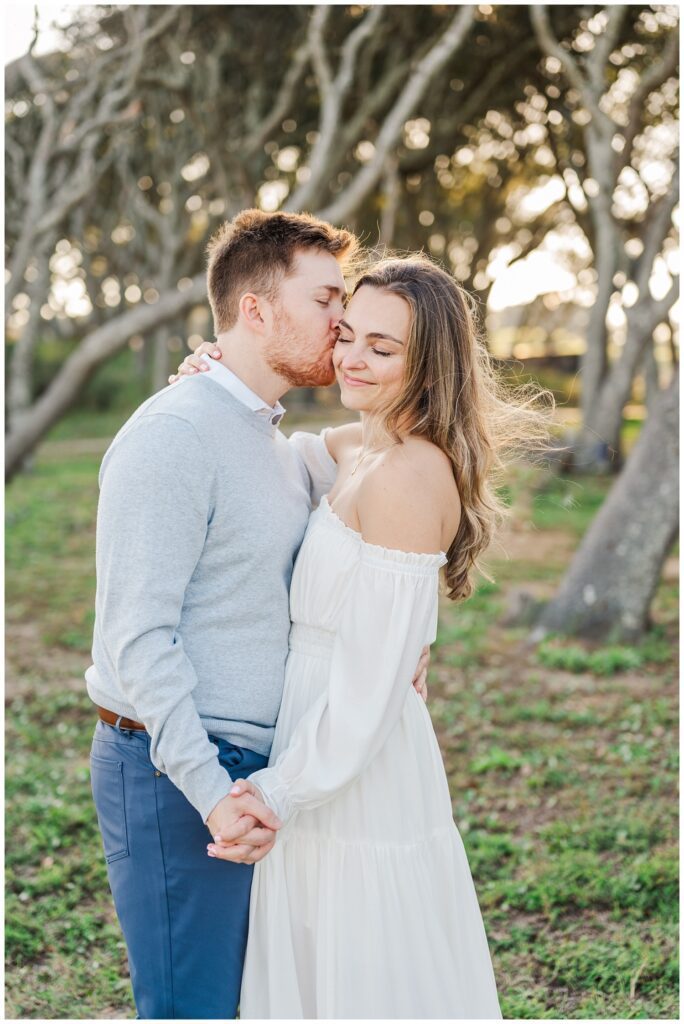 Wilmington wedding photographer taking engagement portraits at Fort Fisher