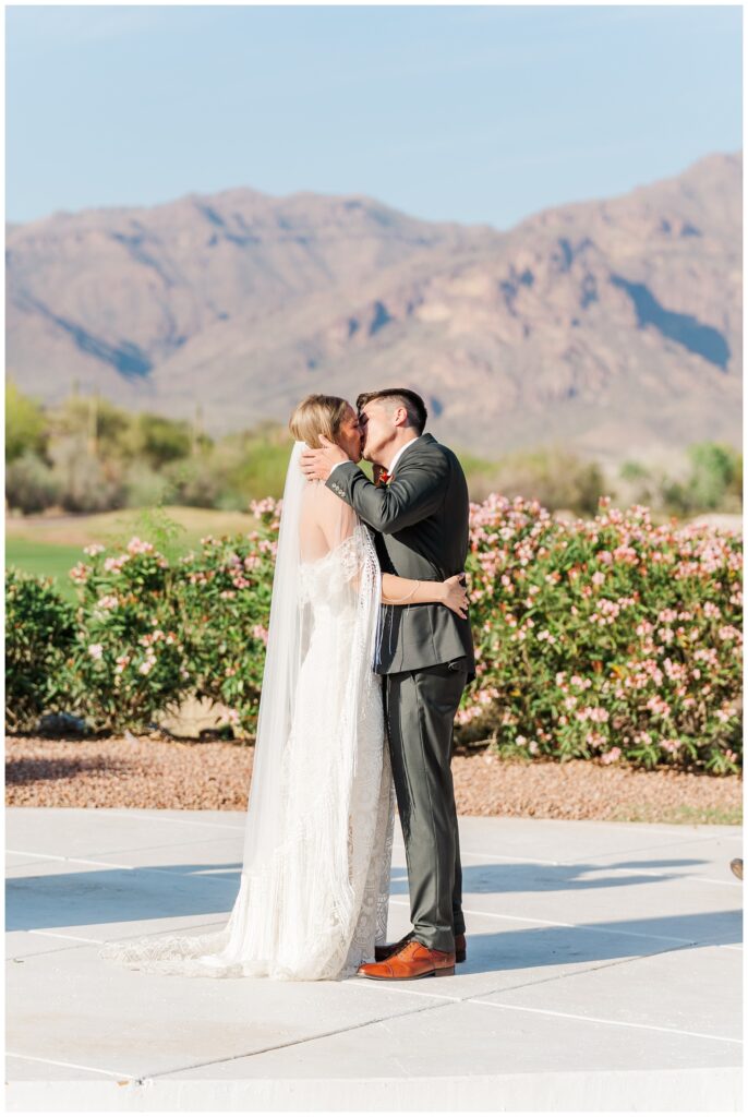 wedding couple kiss after getting married at the Gold Canyon Golf Resort in Arizona