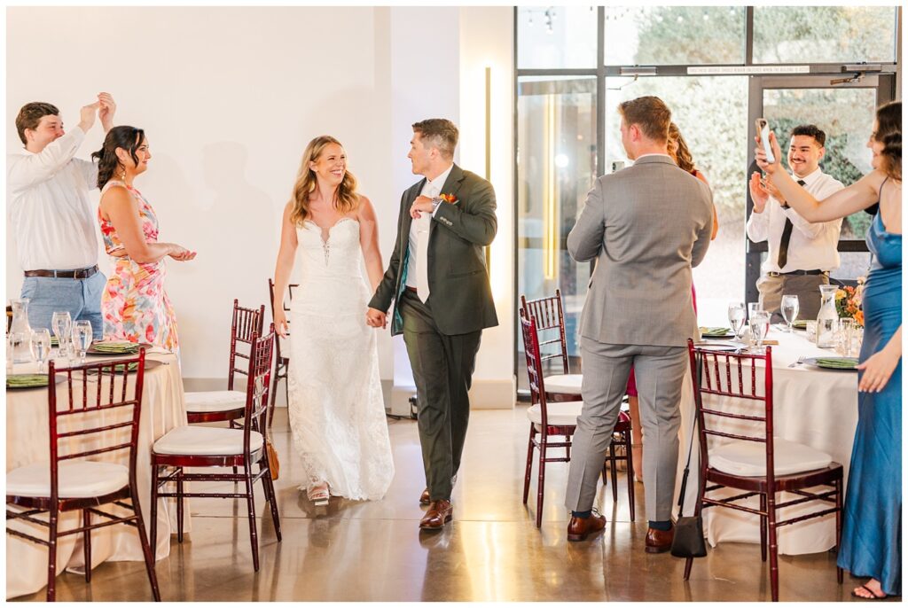 wedding couple making their entrance into the reception at Gold Canyon Resort in Arizona