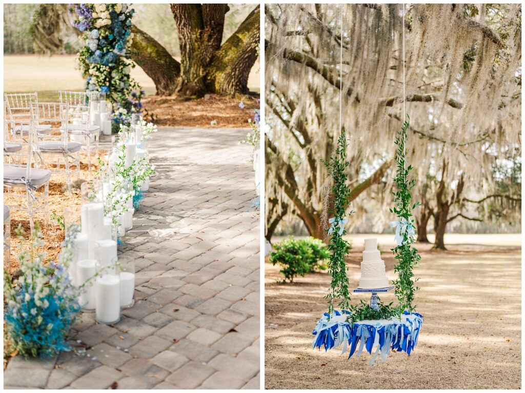 white candles and blue and white flowers along the side of the aisle outside