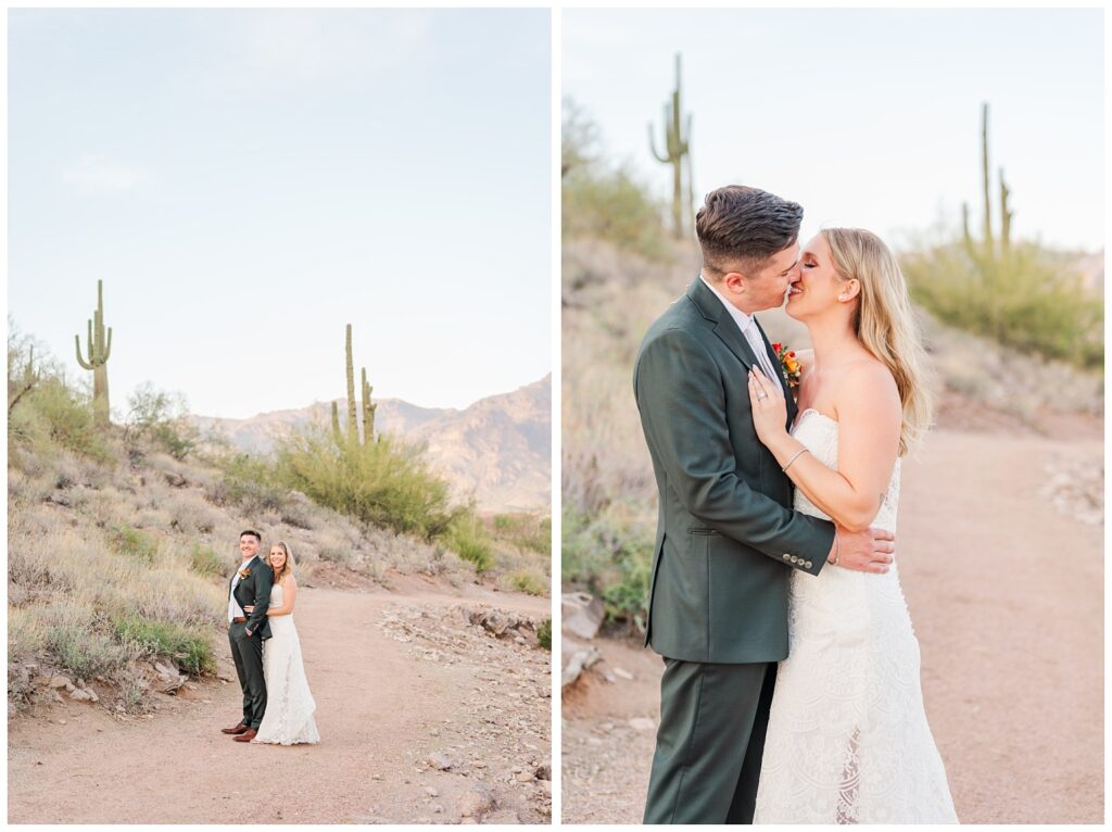 bride and groom share a kiss on a desert trail with cacti in Arizona