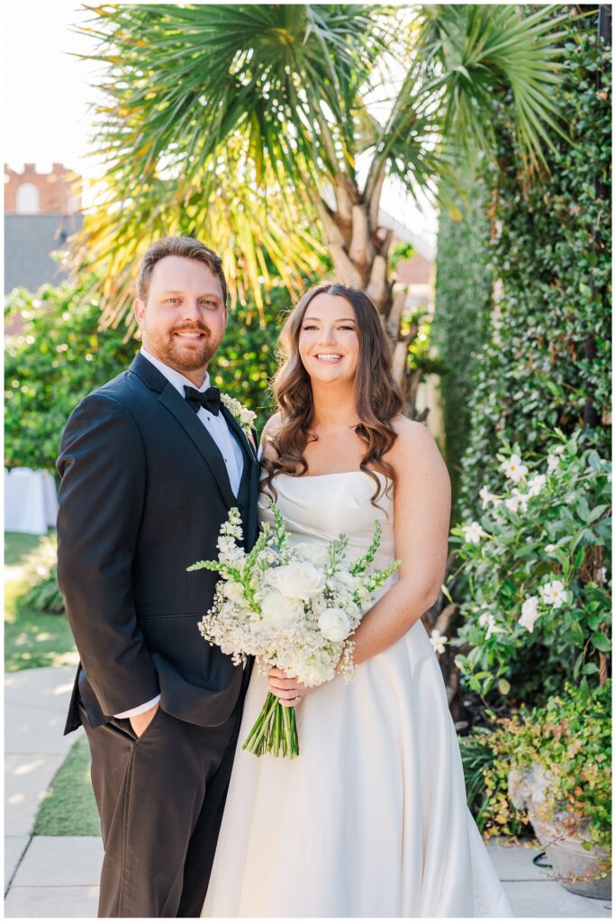 bride and groom posing for portraits before the wedding at Wrightsville Manor