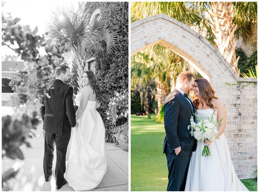 bride and groom posing next to a stone arch outside at the wedding venue 