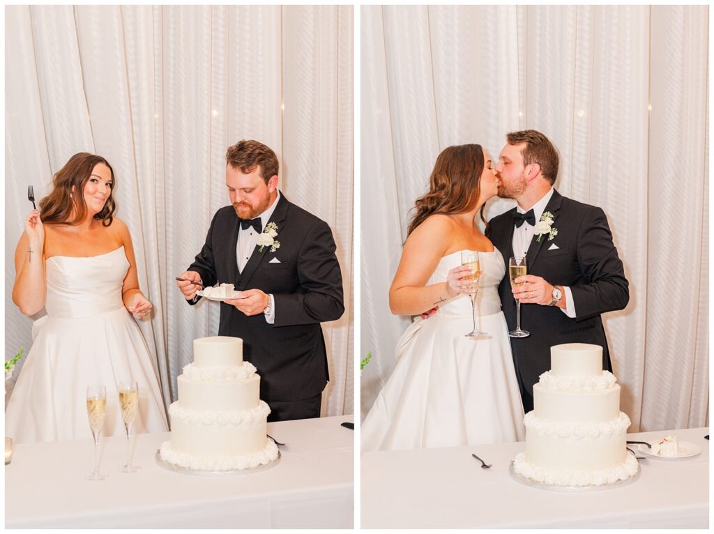 groom and bride kissing and holding glasses after cutting the cake at Wilmington wedding venue
