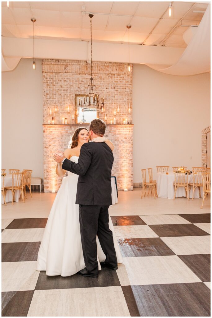 bride and groom have their private last dance together at Wrightsville Manor reception venue
