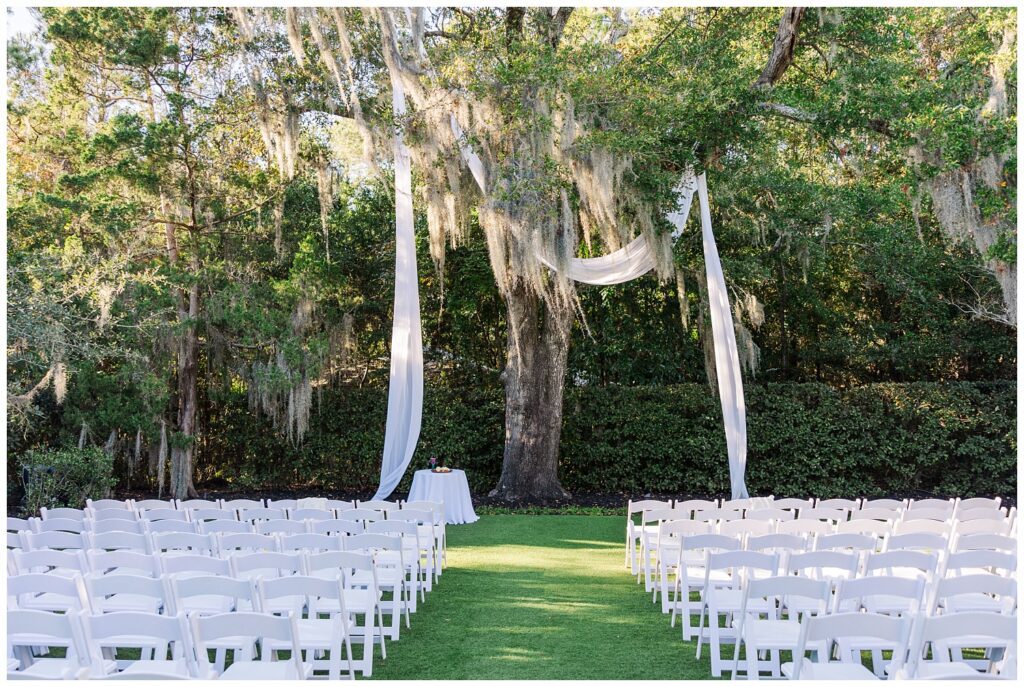 ceremony site outside at a big live oak tree at Wrightsville Manor wedding venue