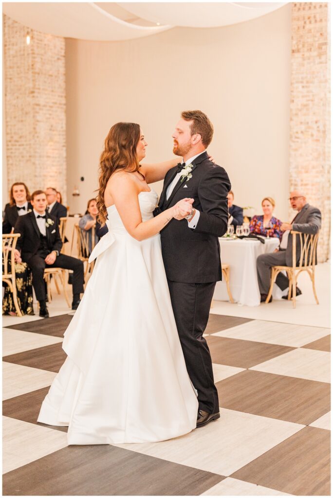 bride and groom dancing on the floor at Wrightsville Manor wedding reception