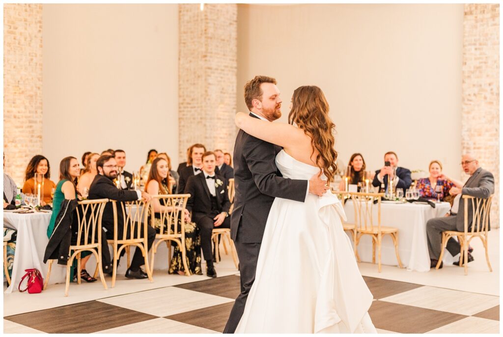 bride and groom dancing on the floor at Wrightsville Manor wedding reception